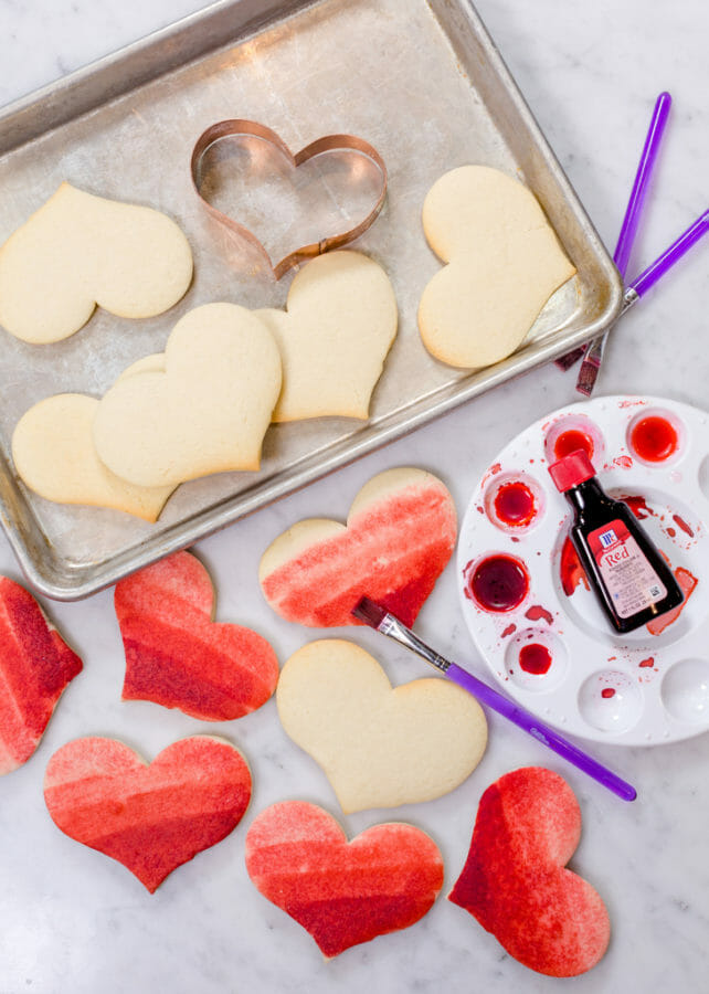 Painted Sugar Cookies | | valentine sugar cookie recipes | valentine cookie recipes | painted cookie recipes | easy valentine desserts | how to decorate valentine cookies || JennyCookies.com and @mccormickspices #paintedcookies #valentinecookies #valentinedesserts #jennycookies