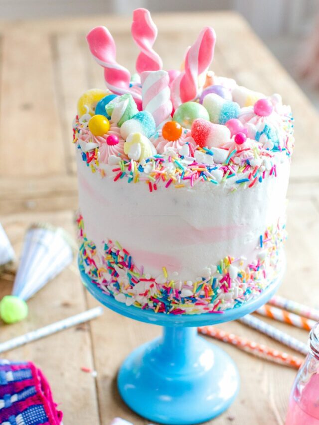 a decorated cake on a cake pedestal