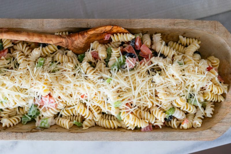 a wooden bowl of ranch pasta salad